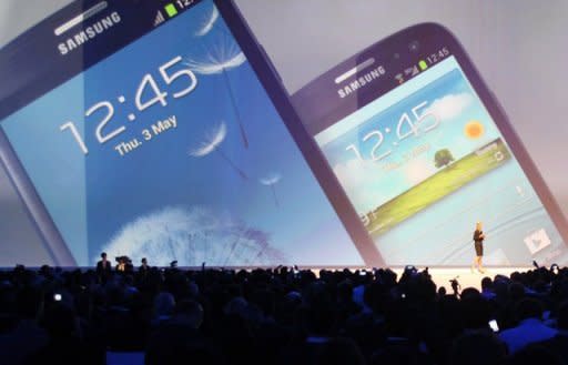 This file photo, released by Samsung Electronics, shows a display of the company's latest smartphone, the Galaxy S3, during a launch event in London in May. Samsung, world's largest smartphone maker, said on Monday it expects to have sold 10 million of its Galaxy S3 model by the end of July, two months after its launch