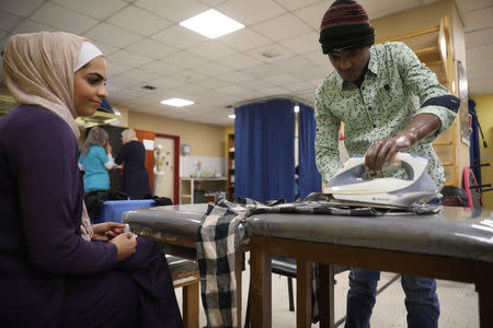 War-wounded Abdullah Ayed, 21 year-old man from Yemen, tries his 3D-printed prosthetic limb at the MSF-run hospital in Amman, Jordan, February 27, 2019. Picture taken February 27, 2019. REUTERS/Muhammad Hamed