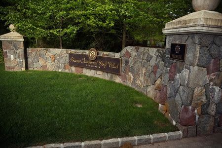 FILE PHOTO: A view shows a signage at U.S. President Donald Trump's golf estate in Bedminster, New Jersey, U.S. May 7, 2017. REUTERS/Jonathan Ernst