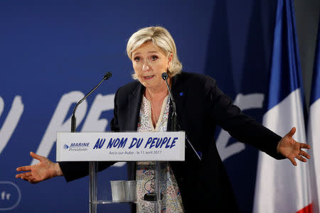 FILE PHOTO: Marine Le Pen, French National Front (FN) political party leader and candidate for French 2017 presidential election, attends a political rally in Arcis-sur-Aube, near Troyes, France April 11, 2017. REUTERS/Benoit Tessier