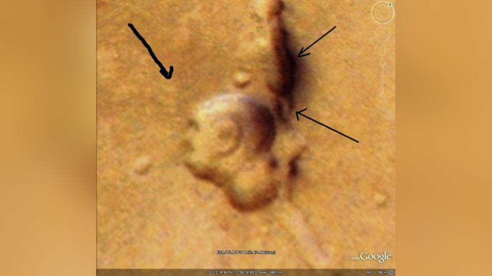 A Martian surface feature that one man says looks like the profile of Mahatma Gandhi.