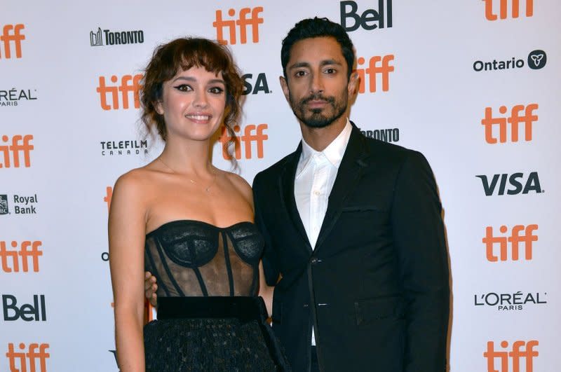 Olivia Cooke (L) and Riz Ahmed arrive for the Toronto International Film Festival premiere of "Sound of Metal" at the Winter Garden Theatre in 2019. File Photo by Chris Chew/UPI