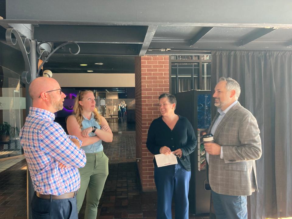 Green Bay Mayor Eric Genrich, left, WEDC Secretary Missy Hughes, second from right, and On Broadway Executive Director Brian Johnson in Old Fort Square. Hughes visited Green Bay Aug. 31 to award $1.3 million in grants to support diverse, women and veteran entrepreneurs.