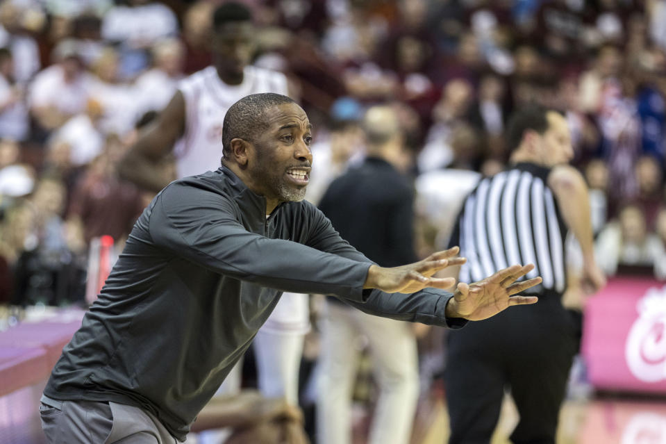 Hofstra head coach Speedy Claxton coaches from the sideline against Charleston during the first half of an NCAA college basketball game, Saturday, Jan. 28, 2023, in Charleston, S.C. (AP Photo/Stephen B. Morton)