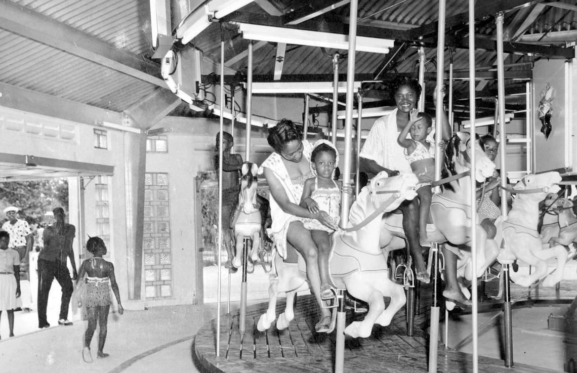 A 1956 photograph shows the carousel at Virginia Key Beach Beach in Miami, Florida. The park was the only beach that Black people could go to during the 1940s and ’50s amid Miami’s segregated era. (AP Photo/Courtesy of Miami-Dade Office of Historic Preservation)
