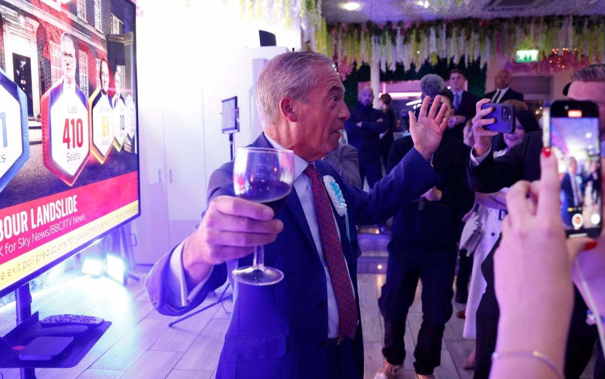 Reform leader Nigel Farage celebrating the general election exit poll at a party in Clacton