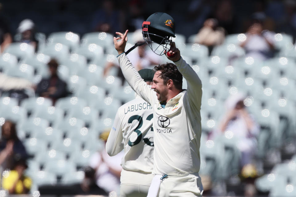 Australia's Travis Head celebrates catching out West Indies' Kraigg Brathwaite on the second day of their cricket test match in Adelaide, Australia, Thursday, Jan. 18, 2024. (AP Photo/James Elsby)