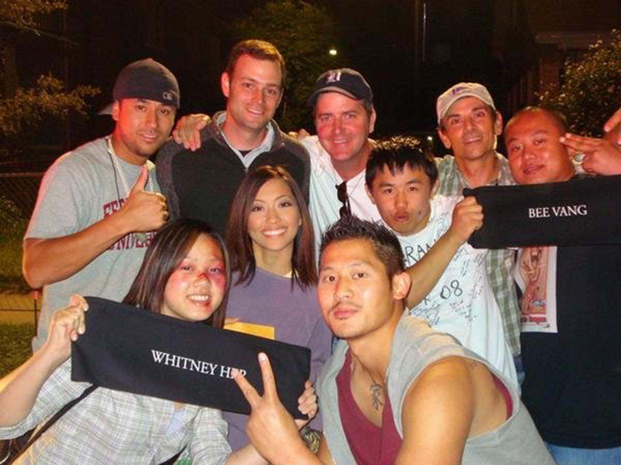 Vang with fellow castmates on the set of 