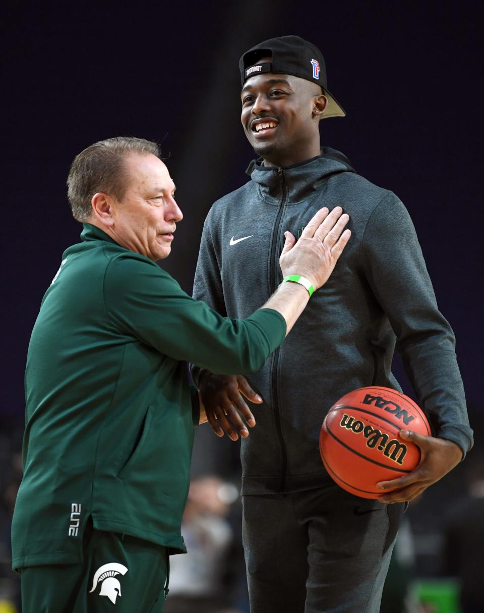 Michigan State head coach Tom Izzo with injured guard Joshua Langford during a practice session for the Final Four Friday, April 5, 2019, in Minneapolis.