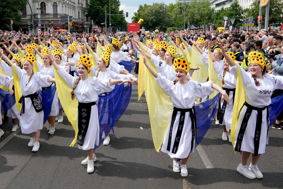 Dancers representing Ukraine perform at the annual Carnival of Cultures parade in Berlin on Sunday (AP)