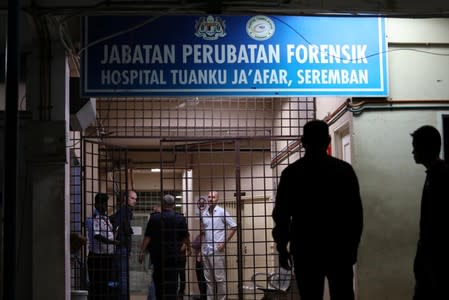 Family members gather to see the body of 15-year-old Irish girl Nora Anne Quoirin at Tuanku Jaafar Hospital in Seremban