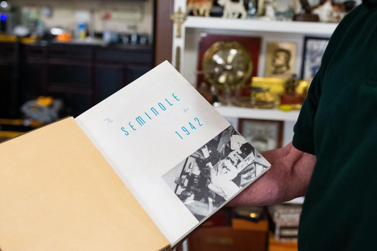 Bill Davis owns two different copies of the “Seminole” yearbook, published by the University of Florida in the 1940s.