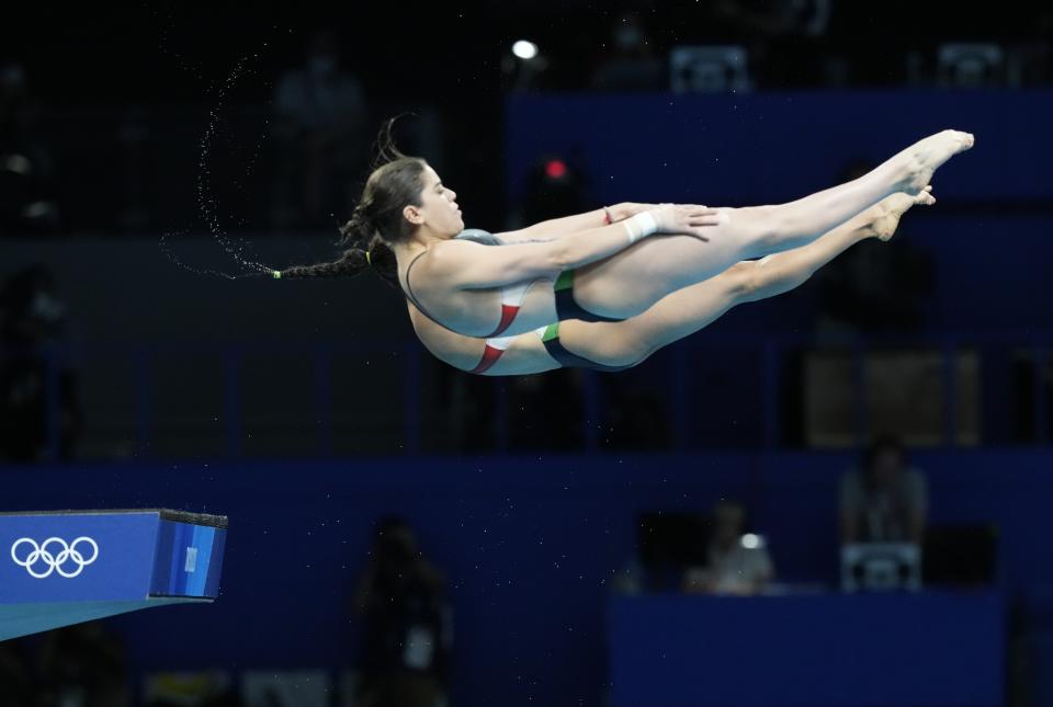 Gabriela Agundez Garcia and Alejandra Orozco Loza of Mexico compete during the women's synchronized 10m platform diving final at the Tokyo Aquatics Centre at the 2020 Summer Olympics, Tuesday, July 27, 2021, in Tokyo, Japan. (AP Photo/Dmitri Lovetsky)