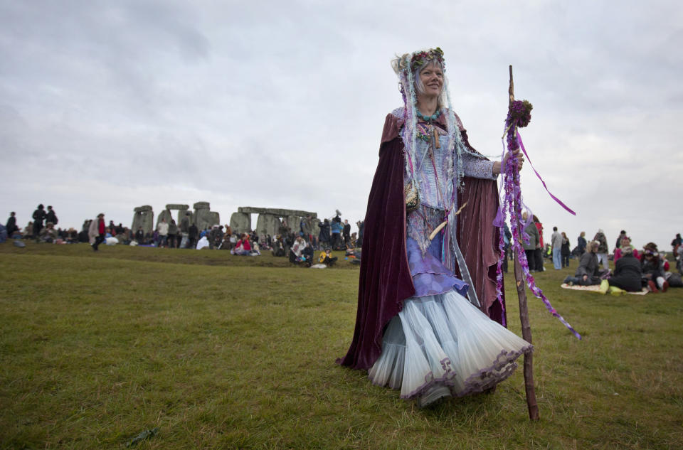 A reveler is pictured as people gather to celebrate the pagan festival of 'Summer Solstice' at Stonehenge in Wiltshire in southern England, on June 21, 2011.(Warren Allott/AFP/Getty Images)