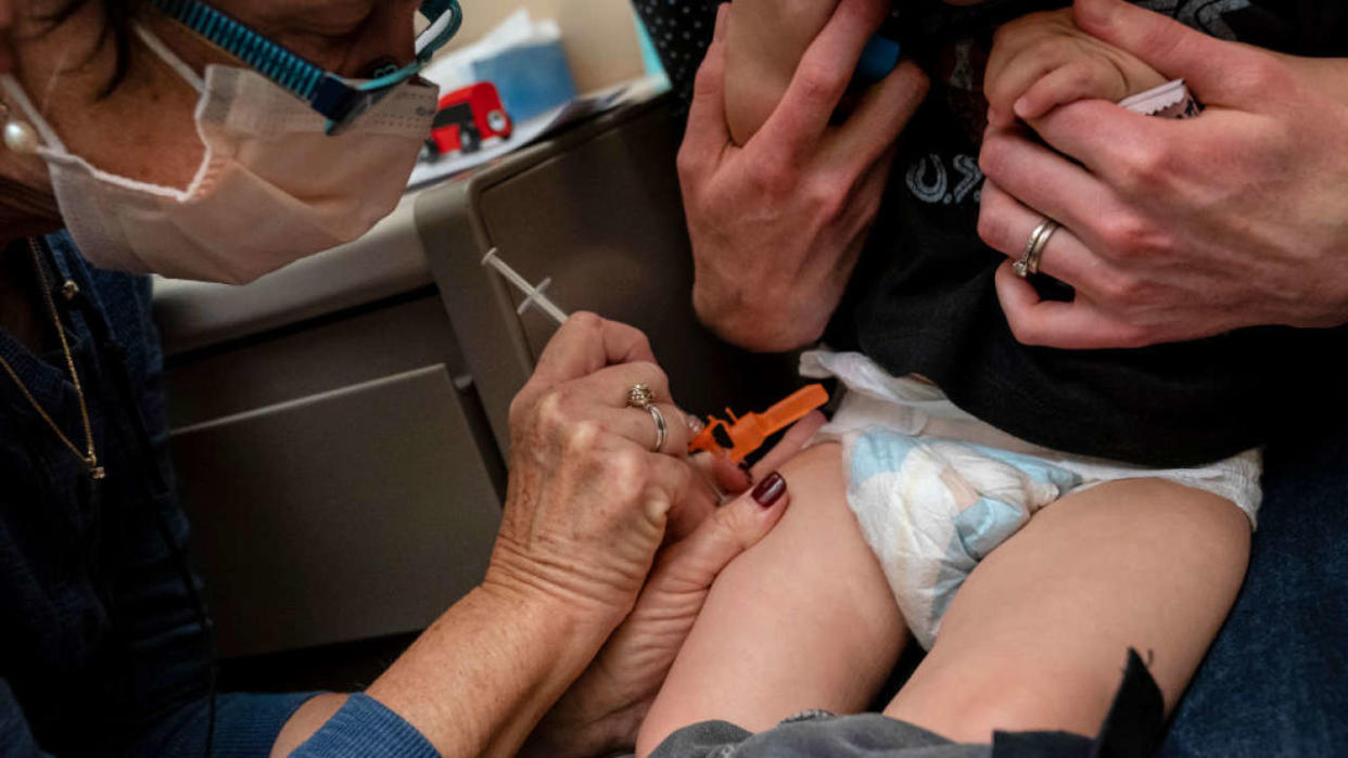 SEATTLE, WA - JUNE 21: A 20-month-old baby receives the first dose of the Pfizer Covid-19 vaccination at UW Medical Center - Roosevelt on June 21, 2022 in Seattle, Washington. Covid-19 vaccinations for children younger than 5 began today across the U.S.  (Photo by David Ryder/Getty Images)