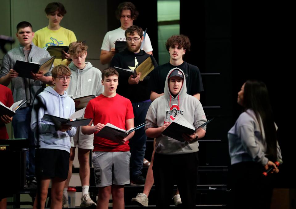 Members of Appleton North High School's choir perform for singer Maa Vue during a rehearsal for upcoming “Mirrors and Windows” concert on May 10, 2024, in Appleton, Wisconsin. The choir is incorporating a few of Vue’s original songs for the concert.