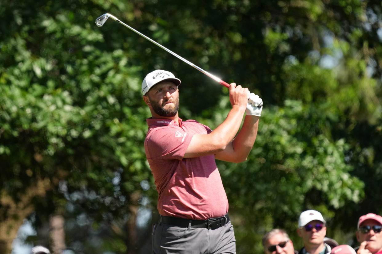 Jon Rahm watches his shot on the fourth hole during the final round of The Masters.