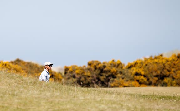 ST ANDREWS, SCOTLAND - MAY 26: Former United States President Barack Obama plays a round of golf at the Old Course on May 26, 2017 in St Andrews, Scotland. (Photo by Robert Perry/Getty Images)