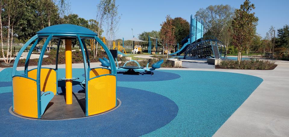 The newly opened playground at Raccoon River Park in West Des Moines includes equipment accessible to children and families of all abilities.