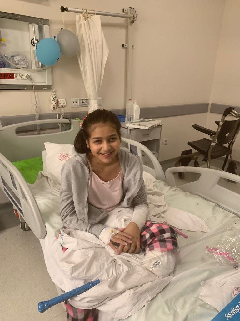 Rayen Bejri, 13, was trapped in rubble for six days after the earthquake in Turkey in February 2023.  now in New Jersey, she awaits more medical care and will be fitted for a prosthetic leg