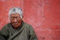 Yushu, Qinghai Province, China. <br><br>An old Tibetan man relaxing in the afternoon Himalayan sun. <br><br>Camera: Nikon D60 <br><br>Emil Mikkelsen, Denmark <br><br>Commended, First Shot Work, Rest, Play (beginners’ single image category)