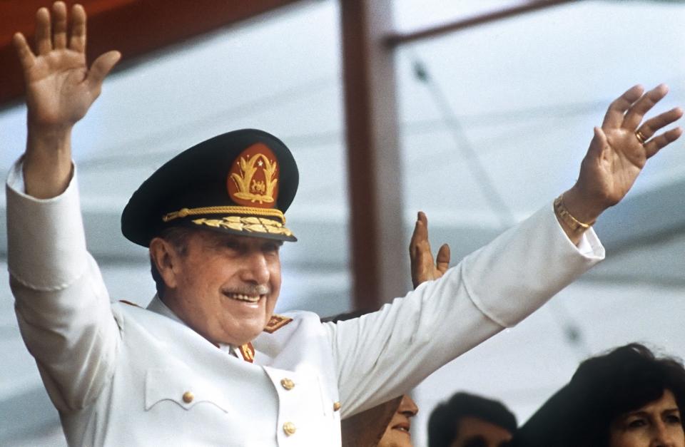 General Augusto Pinochet waves to the crowd on Sept. 11, 1986 in Santiago, Chile, on the 13-year anniversary of his military coup.