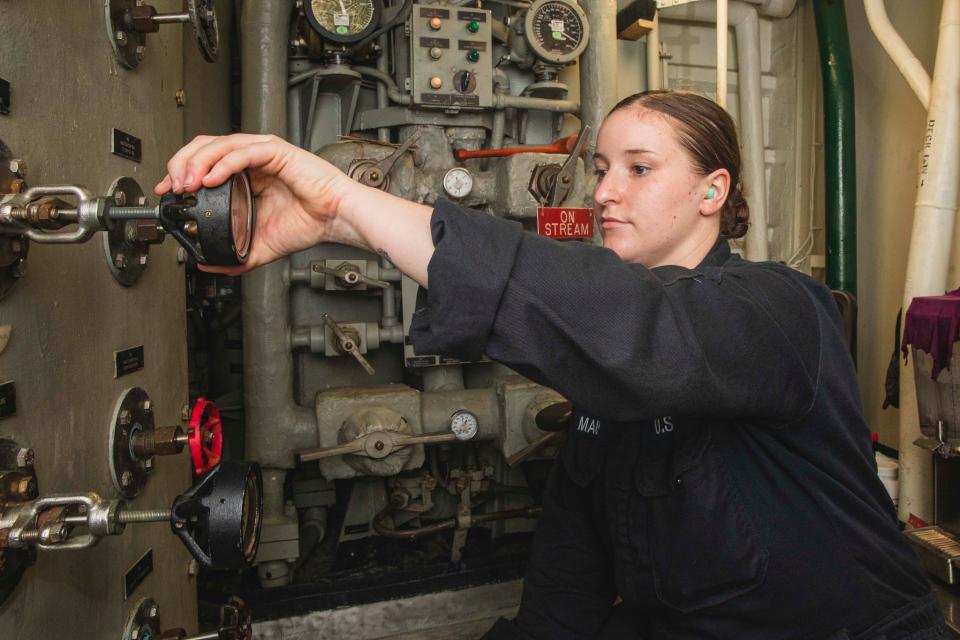 U.S. Navy Machinist's Mate 3rd Class Jaden Mauk, from Marion aligns the O2N2 producer in preparation for cleaning process aboard the aircraft carrier USS Nimitz (CVN 68).