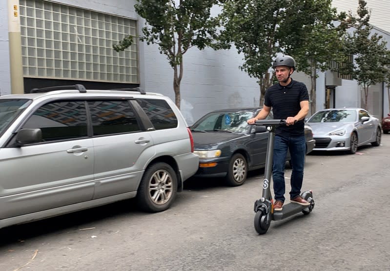 Scooter technology firm Superpedestrian founder and CEO Biderman shows the companyÕs new scooter in San Francisco