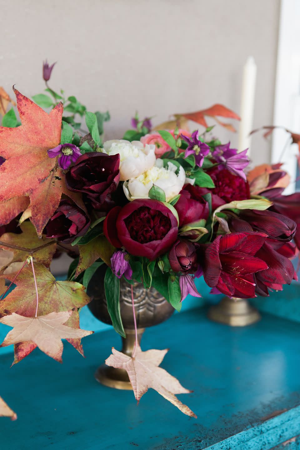 53) Foilage And Burgundy Flowers