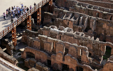 Tourists are seen at the Colosseum in Rome, Italy, October 17, 2017. Picture taken October 17, 2017. REUTERS/Max Rossi