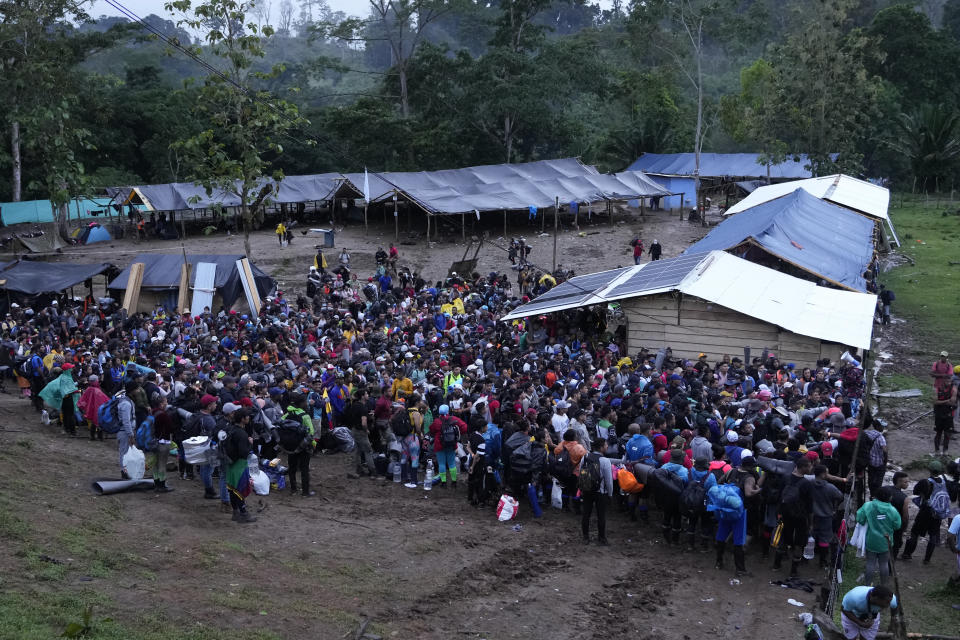 FILE - Migrants, mostly Venezuelans, prepare to start crossing the Darien Gap from Colombia into Panama, in hopes of reaching the U.S., Oct. 15, 2022. (AP Photo/Fernando Vergara, File)