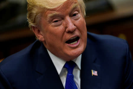 U.S. President Donald Trump speaks with reporters after meeting with Senate Majority Leader Mitch McConnell (R-KY) and House Speaker Paul Ryan (R-WI) at the White House in Washington, U.S. November 28, 2017. REUTERS/Jonathan Ernst