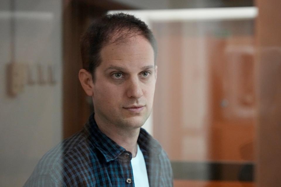 Wall Street Journal reporter Evan Gershkovich stands in a glass cage in a courtroom at the Moscow City Court on Tuesday (Copyright 2023 The Associated Press. All rights reserved)