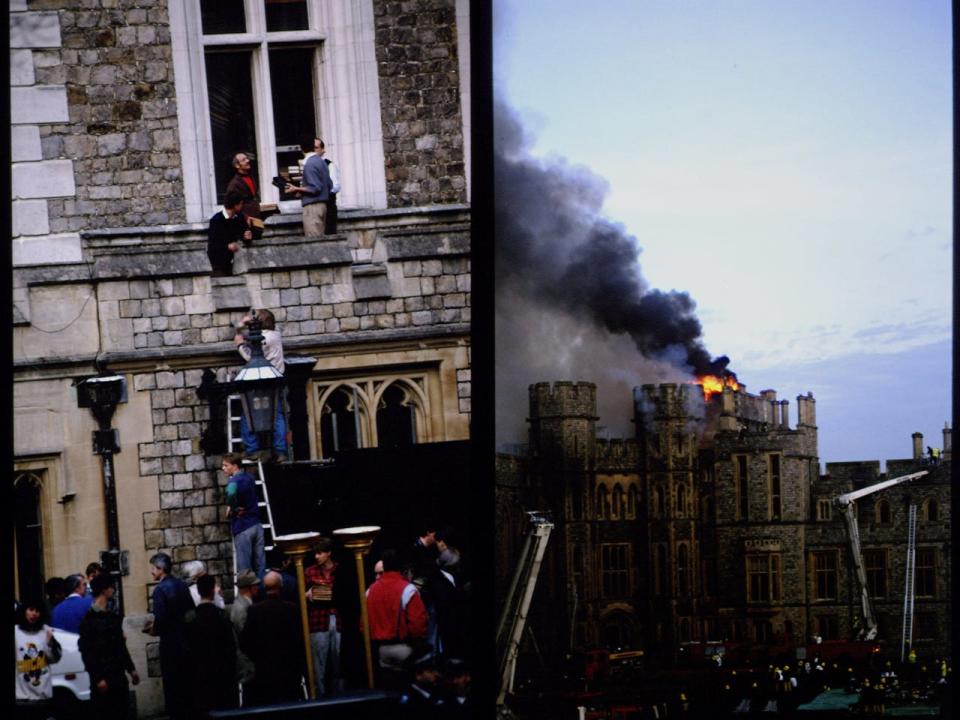 People lowering books down from Windsor Castle as the fire continues.