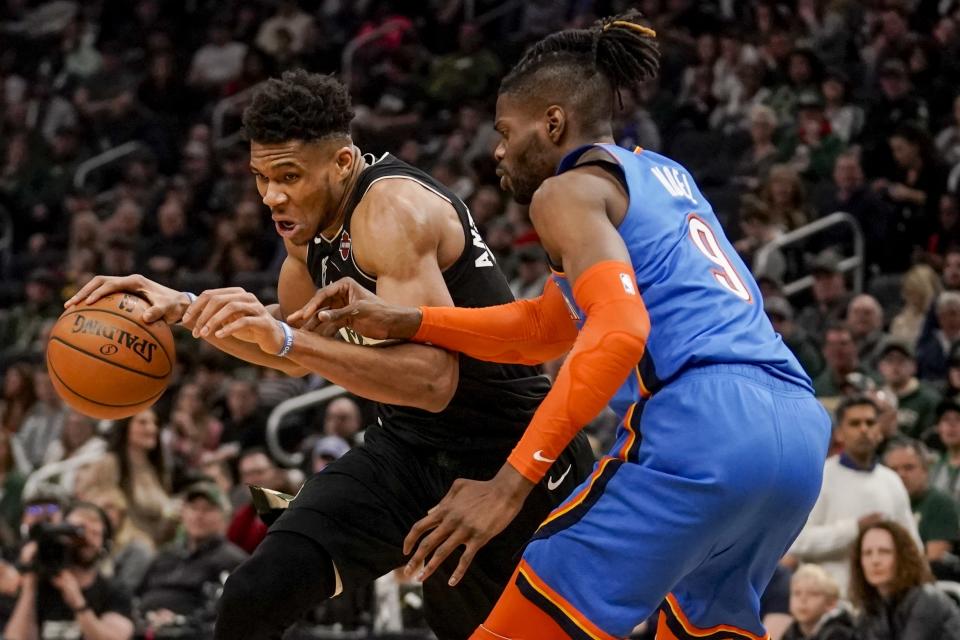 Milwaukee Bucks' Giannis Antetokounmpo tries to get past Oklahoma City Thunder's Nerlens Noel during the second half of an NBA basketball game Friday, Feb. 28, 2020, in Milwaukee. (AP Photo/Morry Gash)