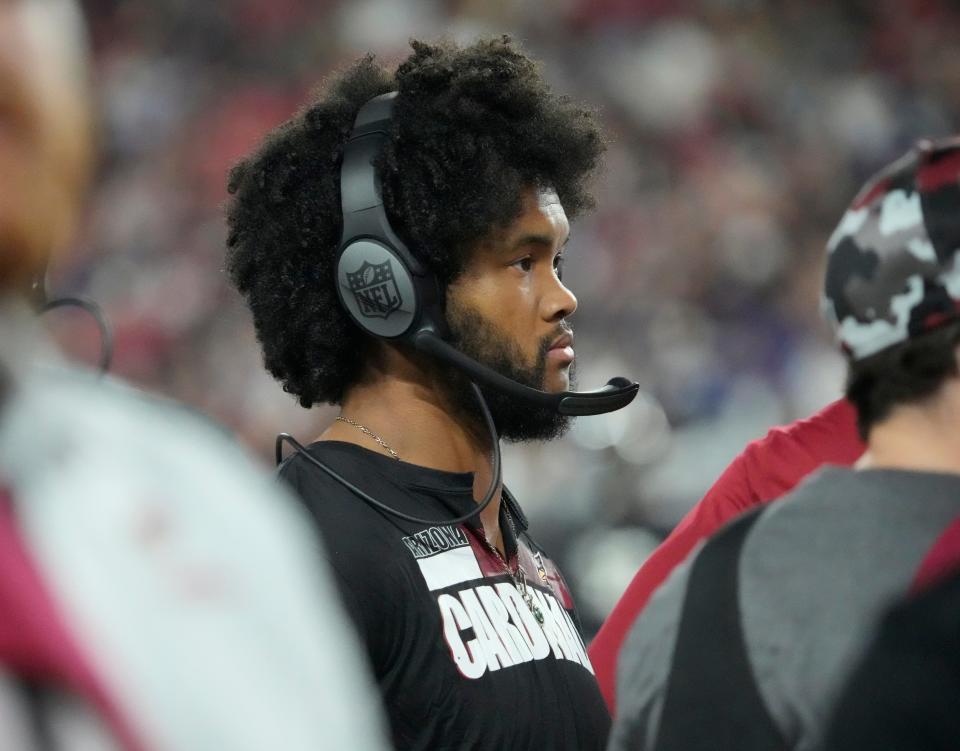 Aug 21, 2022; Glendale, Ariz., United States;  Arizona Cardinals quarterback Kyler Murray wears a headset during the third quarter against the Baltimore Ravens in preseason action at State Farm Stadium.