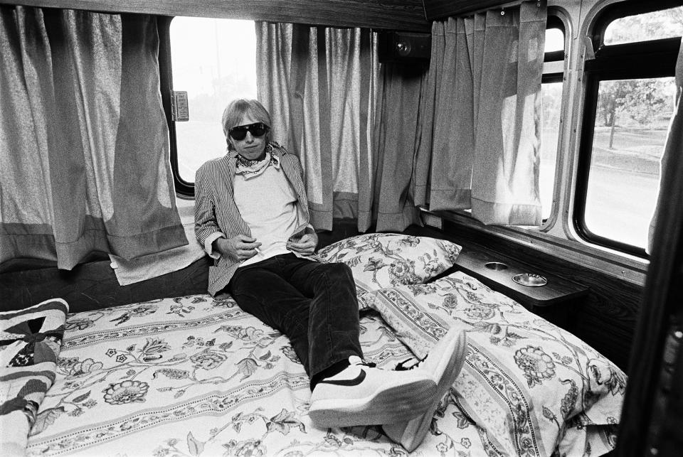<p>Tom Petty on his tour bus in 1981 in Chicago. (Photo: George Rose/Getty Images) </p>