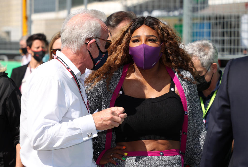 Seen here, Serena Williams chats on the grid before the US Grand Prix. 