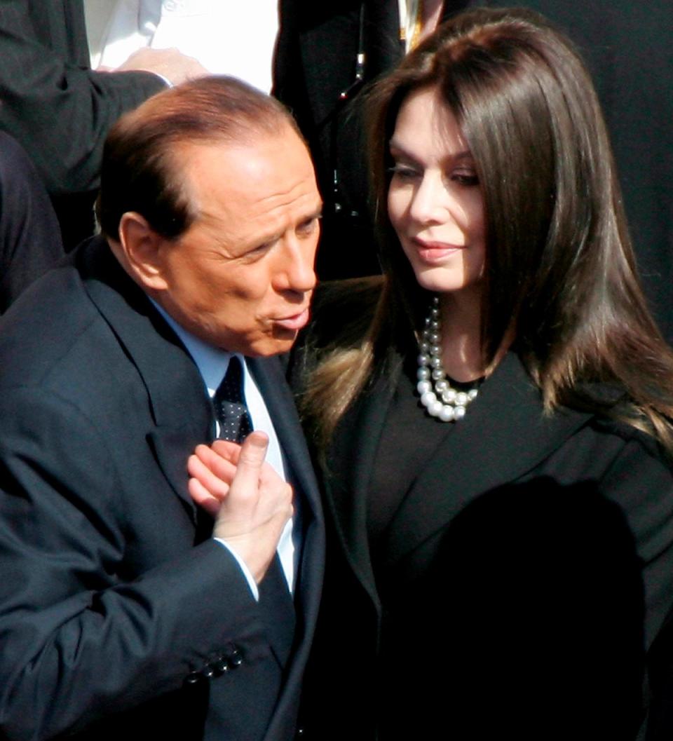 Berlusconi and his wife at the time, Veronica Lario, in 2005 (EPA)