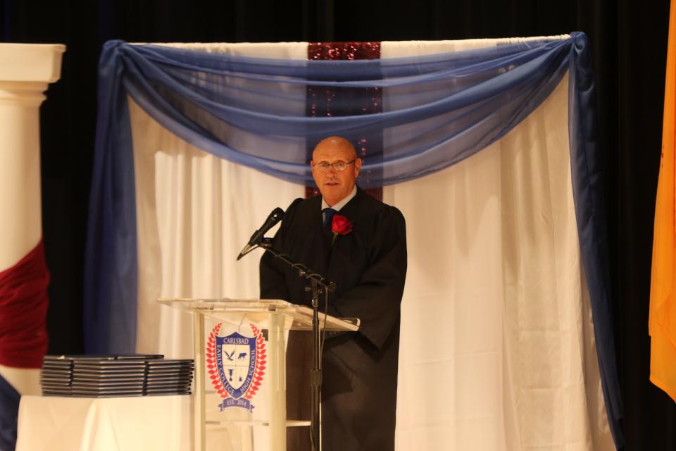 Carlsbad Municipal Schools Superintendent Dr. Gerry Washburn addresses the graduating class of Carlsbad's Early College High School on May 19,2023.