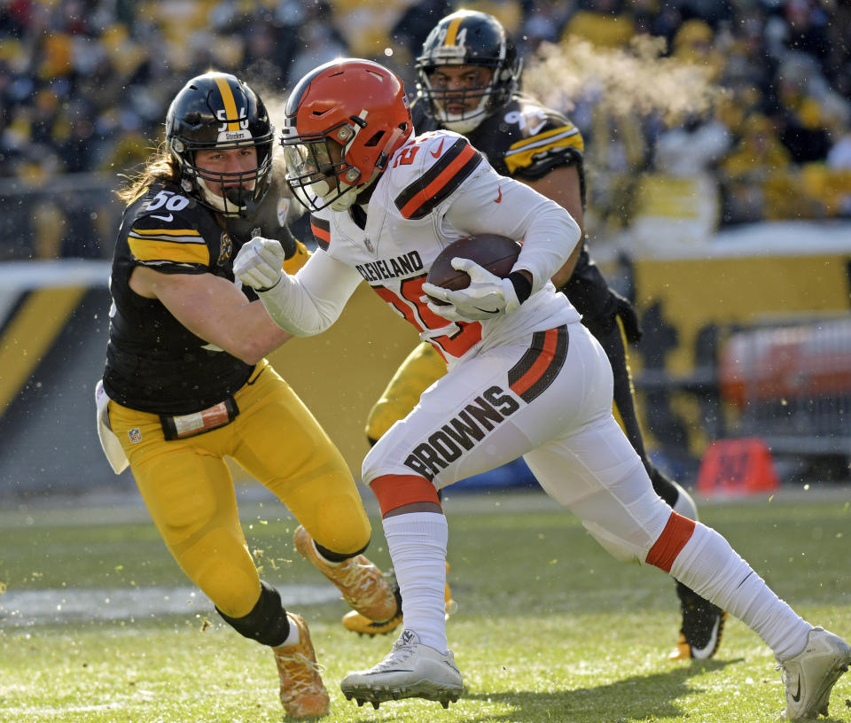 <p>Cleveland Browns running back Duke Johnson (29) carries the ball with Pittsburgh Steelers outside linebacker Anthony Chickillo (56) defending during the first half of an NFL football game in Pittsburgh, Sunday, Dec. 31, 2017. (AP Photo/Don Wright) </p>