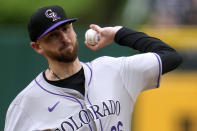 Colorado Rockies starting pitcher Austin Gomber delivers during the first inning of a baseball game against the Pittsburgh Pirates in Pittsburgh, Saturday, May 4, 2024. (AP Photo/Gene J. Puskar)