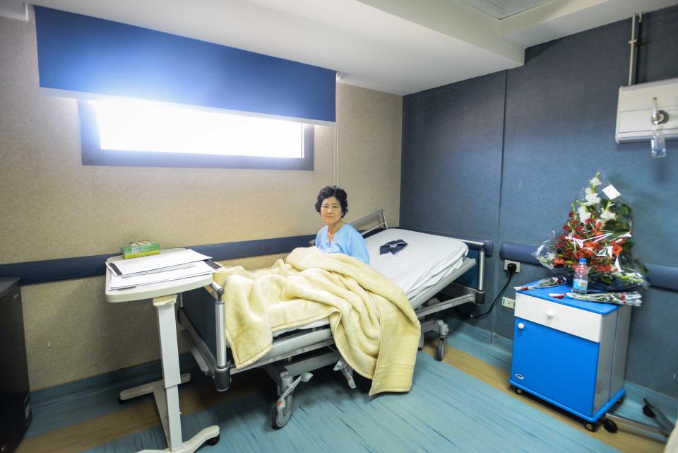 An unidentified South Korean woman who was wounded in a deadly explosion Sunday near the Egyptian border crossing with Israel at Taba, rests in a hospital in Sharm el Sheikh, Egypt, Monday, Feb. 17, 2014. An explosion tore through a bus filled with South Korean sightseers in the Sinai Peninsula on Sunday, killing at least four people and raising fears that Islamic militants have renewed a bloody campaign to wreck Egypt’s tourism industry. (AP Photo)