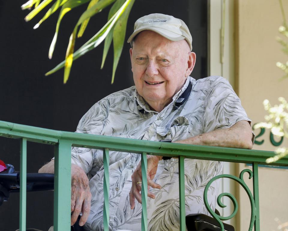 Sam Reck on the final visit with his wife, JoAnn: "They suited us all up in all protective gear. We might have looked rather ominous, but we could hold her hand and talk to her to try to reassure her that we loved her."