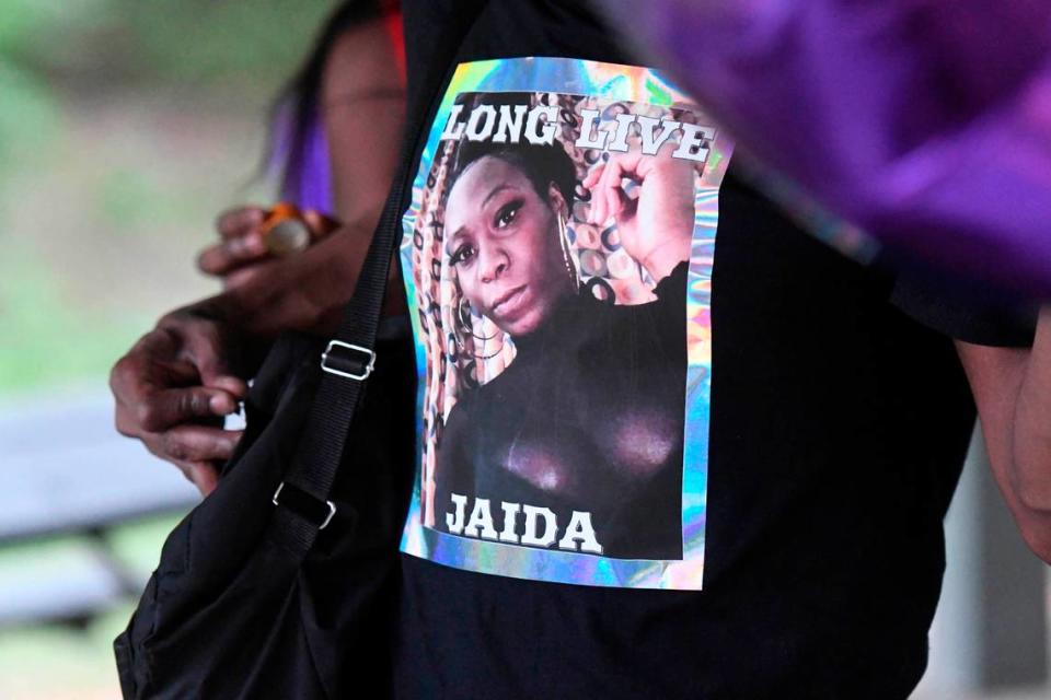 An attendee to a memorial for Jaida Peterson wears a shirt with her photo on it at Tuckaseegee Park on April 9, 2021. Police discovered the body of Peterson, 29, in a hotel room, on Easter Sunday. 
