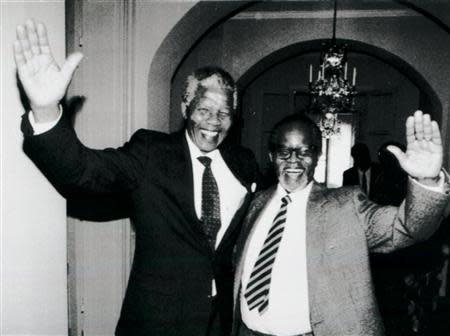 African National Congress leaders Nelson Mandela (L) and Oliver Tambo meet for the first time after 28 years in Stockholm, in this March 12, 1990 file photo. REUTERS/Anders Holmstroem/Files