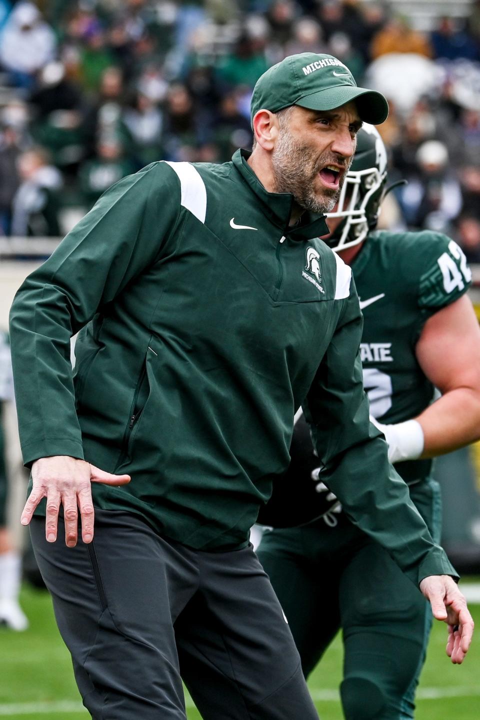 Michigan State's defensive coordinator Joe Rossi works with the linebackers during the Spring Showcase on Saturday, April 20, 2024, at Spartan Stadium in East Lansing.