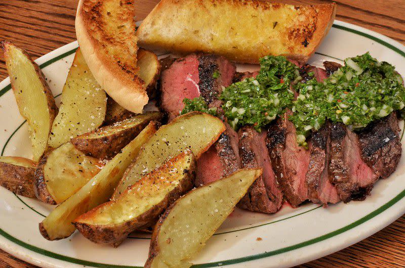 Flat iron steak with chimichurri and potatoes