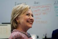 U.S. Democratic presidential candidate Hillary Clinton smiles as she visits Galvanize, a learning community for technology, in Denver, U.S. June 28, 2016. REUTERS/Rick Wilking