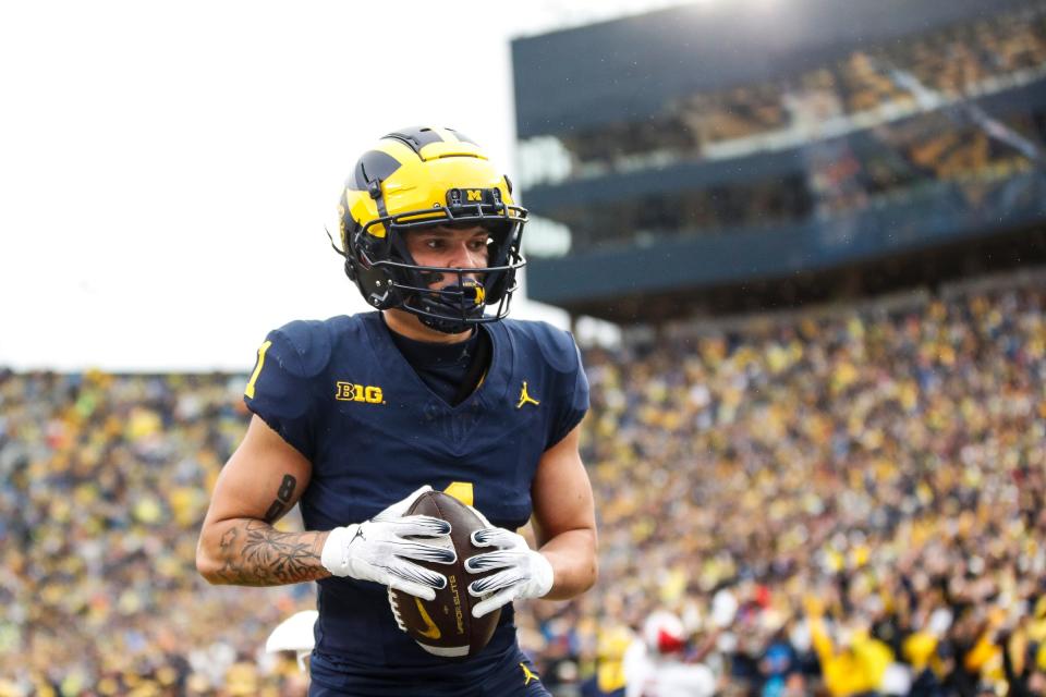 Michigan wide receiver Roman Wilson makes a catch for a touchdown against Indiana during the first half at Michigan Stadium in Ann Arbor on Saturday, Oct. 14, 2023.